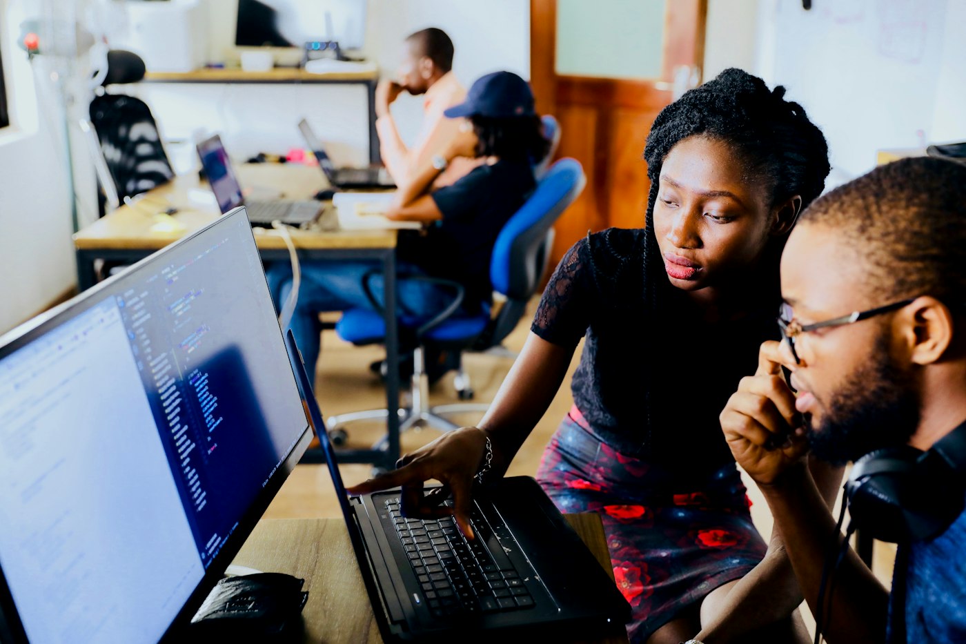 NYC software engineers reviewing production code during a paid work trial